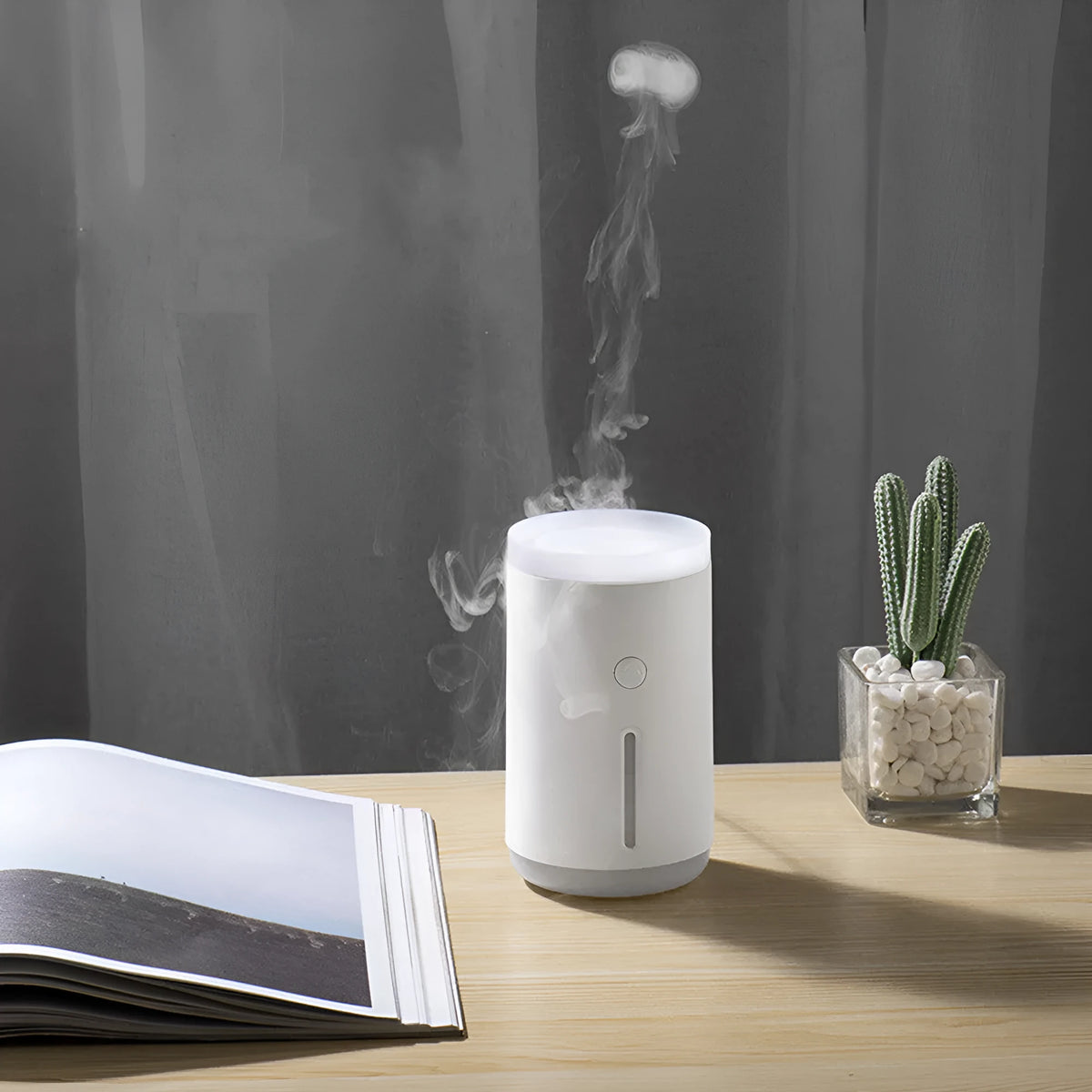 Spitting Circle humidifier in porcelain white with large fog output and dual atomisation modes for desktop use