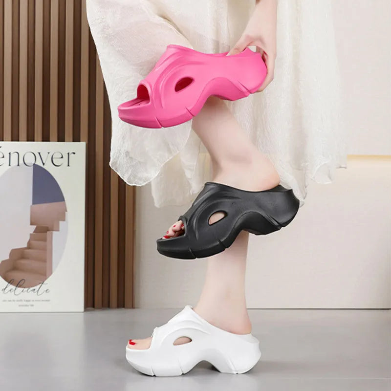 Women's thick-soled EVA beach slippers in white, black, and rose red colours with round toe design