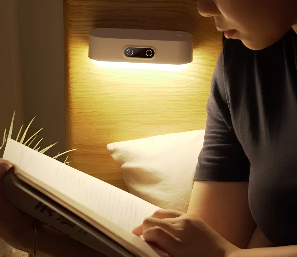 White magnetic USB rechargeable LED sensor light with touch controls on a curved panel
