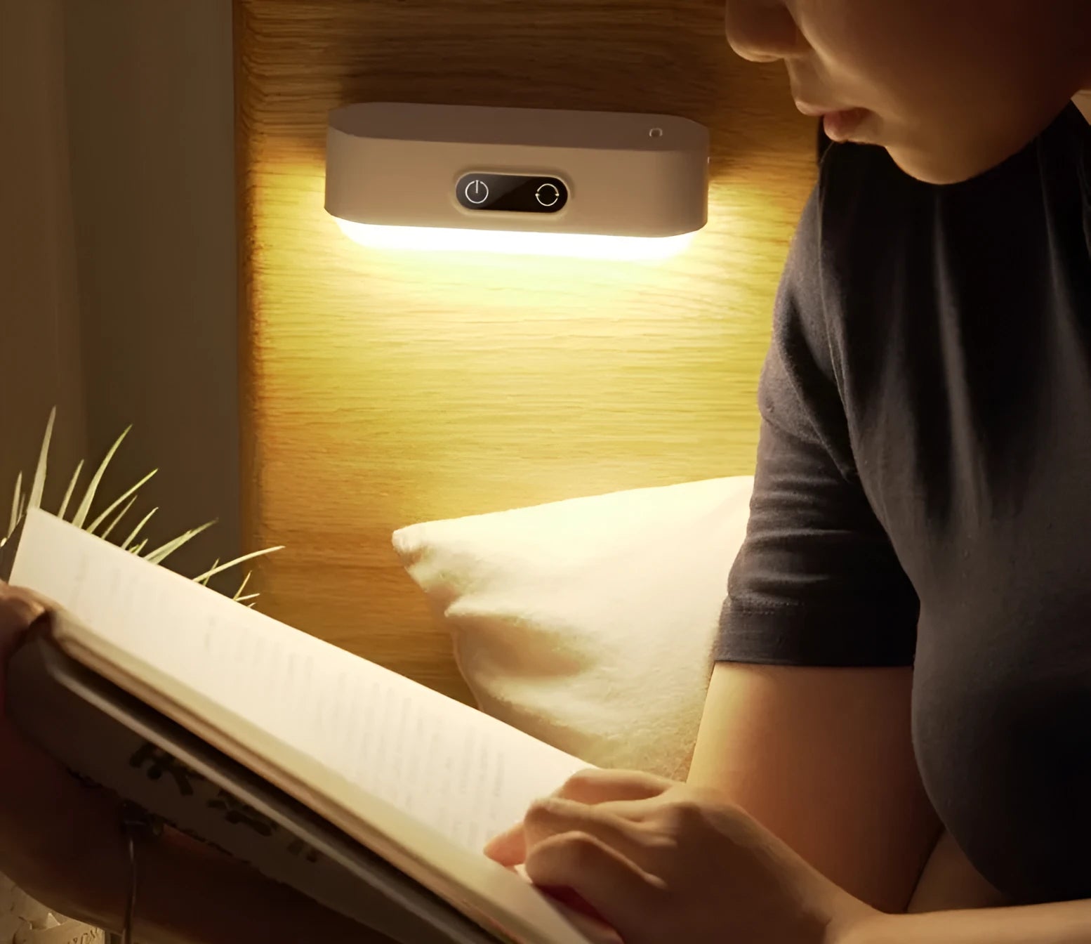 White magnetic USB rechargeable LED sensor light with touch controls on a curved panel