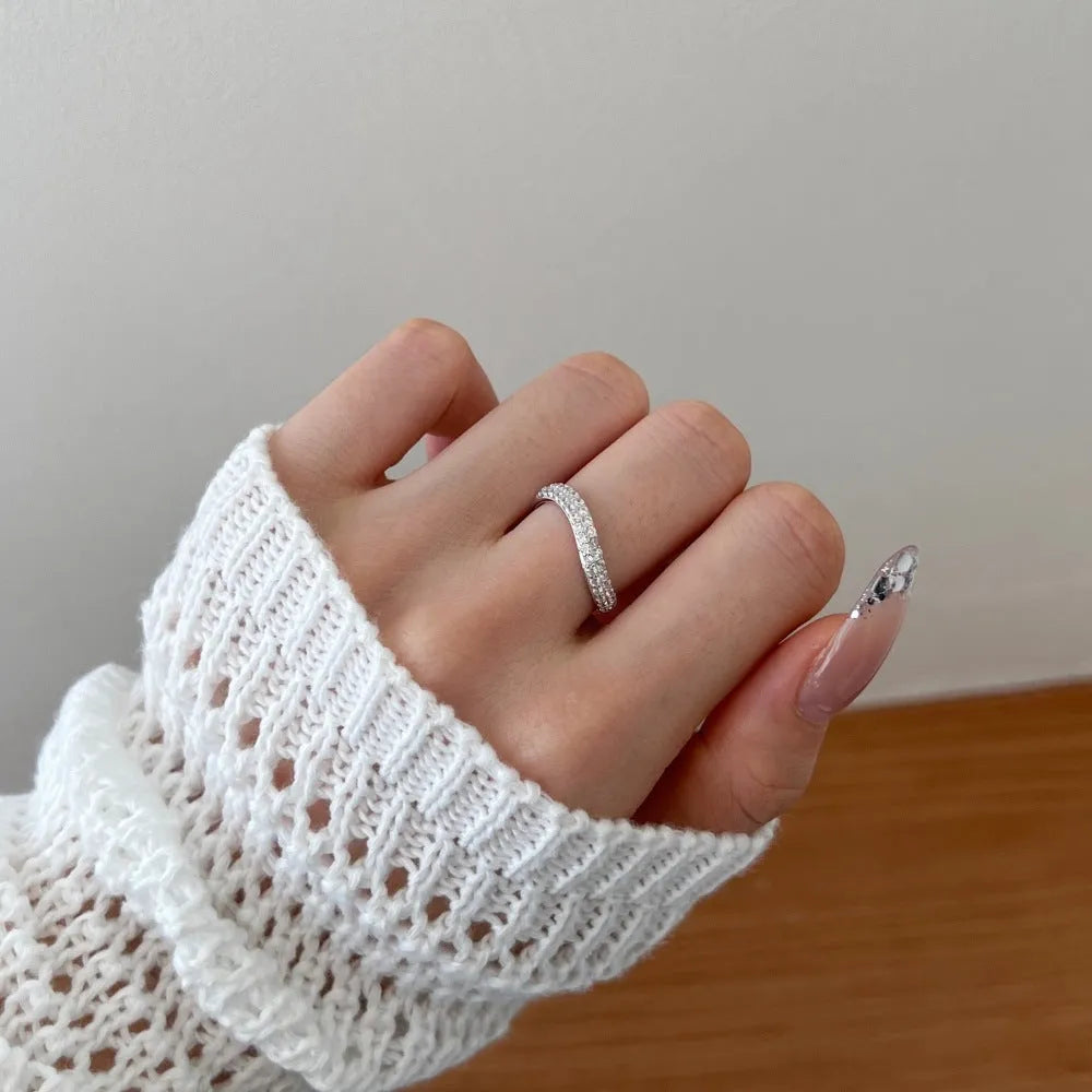 S925 sterling silver snake-shaped ring with zircon inlay, platinum electroplated finish on display
