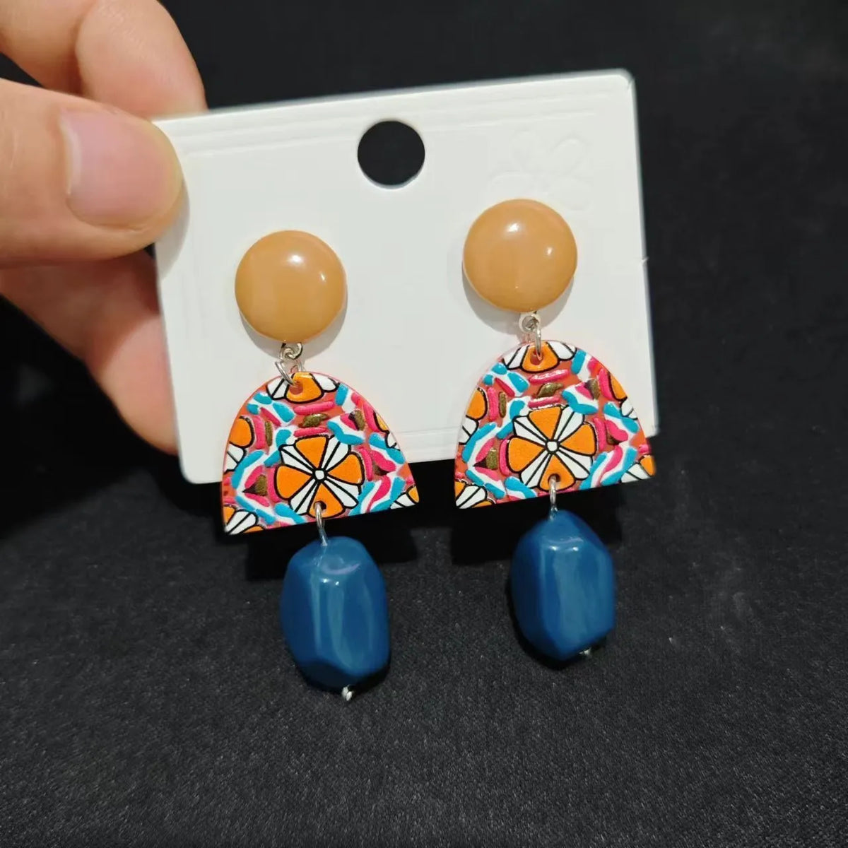 Retro yellow and blue acrylic earrings with irregular geometric shape and electroplated finish, one pair
