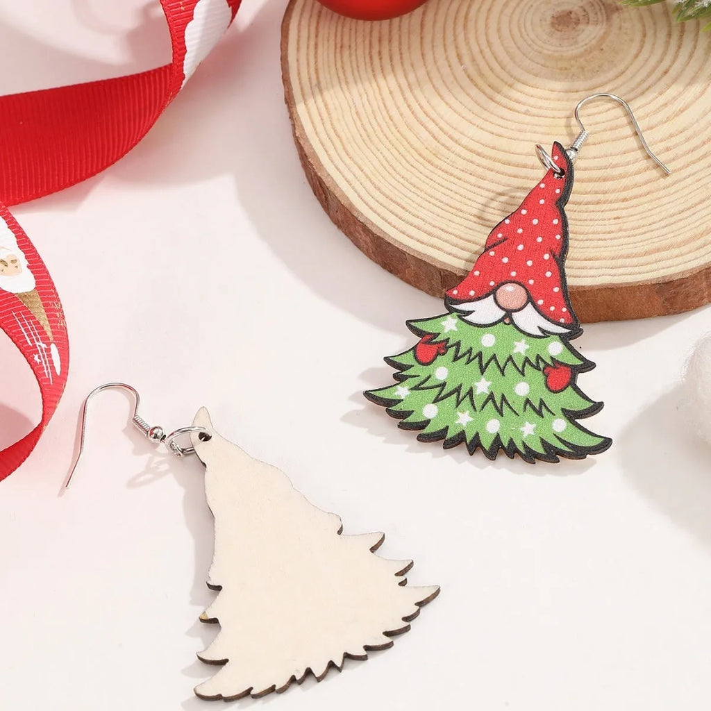 Wooden Christmas earrings showing Christmas tree and water drop snowman designs with geometric shapes
