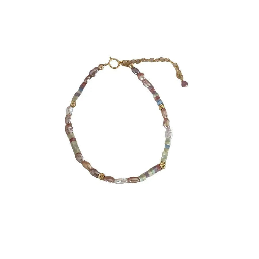 Purple natural pearl bracelet and necklace set with 14K gold gilding and irregular pearl shapes