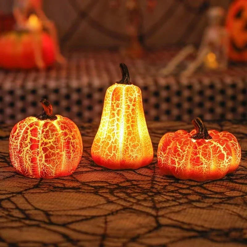 Enchanting resin pumpkin lanterns with realistic textures and LED candle illumination for Halloween decor and celebrations