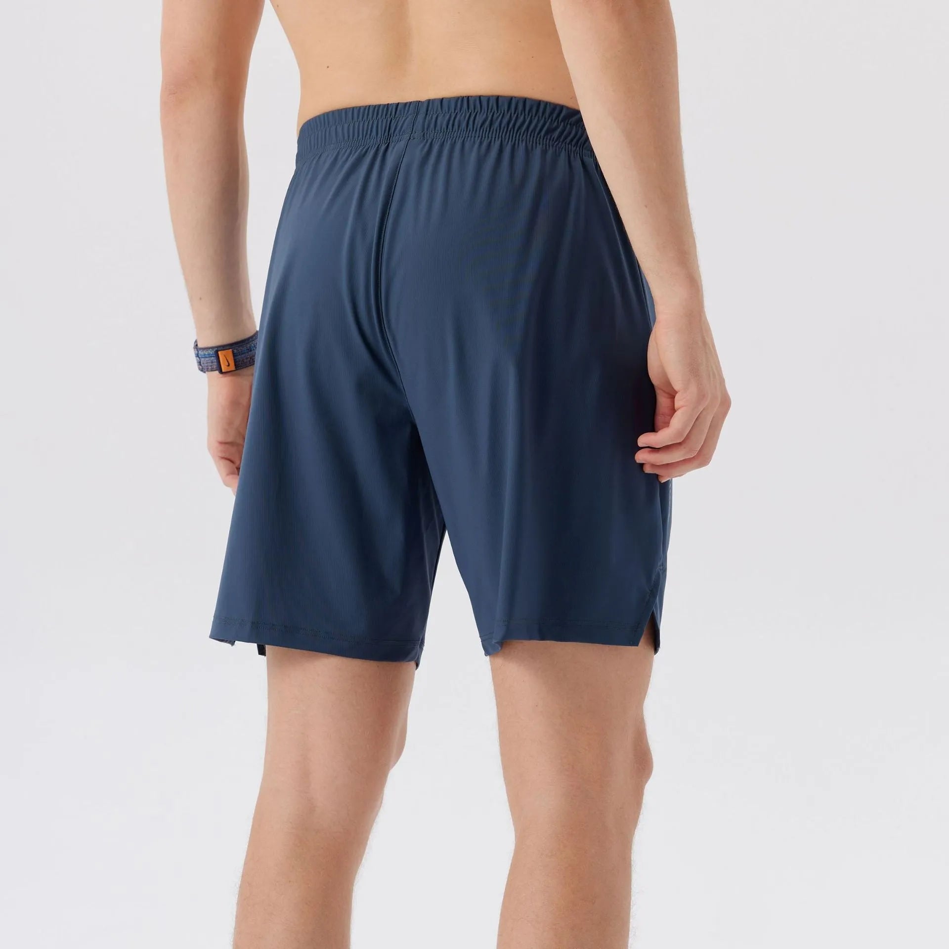 Men's ice silk sports shorts in nylon fabric with mid waist design, shown in available colours