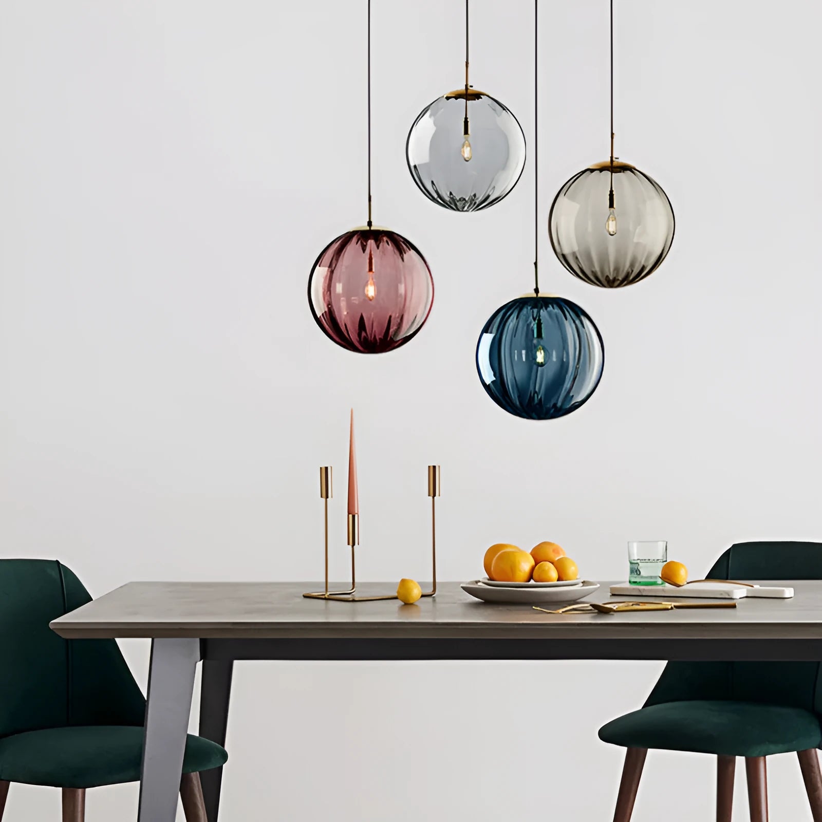 Modern spherical glass pendant light with water-wave texture, shown in a solid colour, hanging from a ceiling.