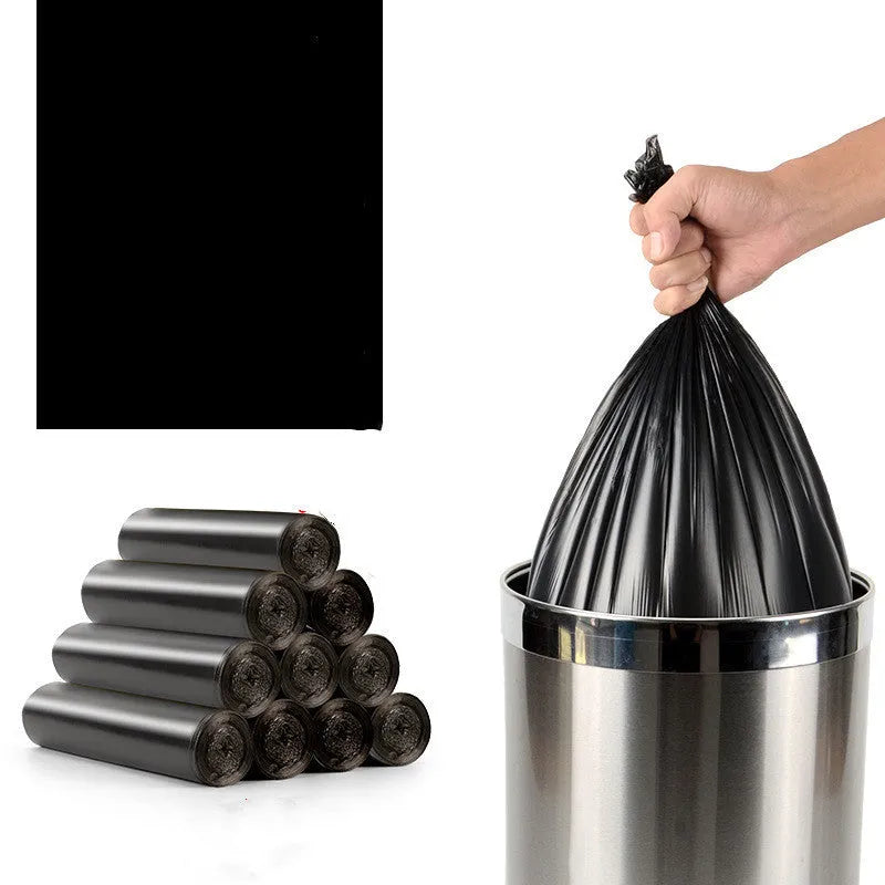 Roll of thickened black disposable plastic kitchen bags with flat-mouth design showing 50x60cm dimensions