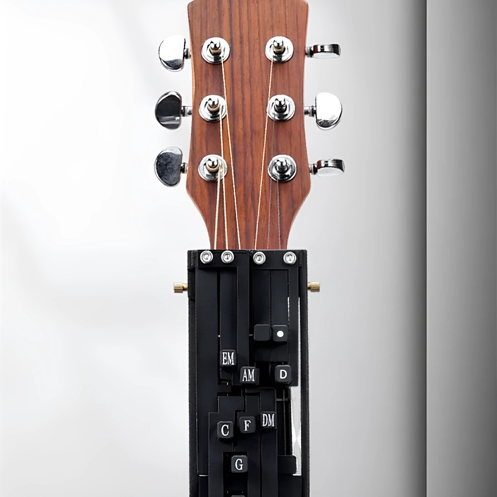 Automatic guitar chord changer device for beginner folk guitar practice with singing