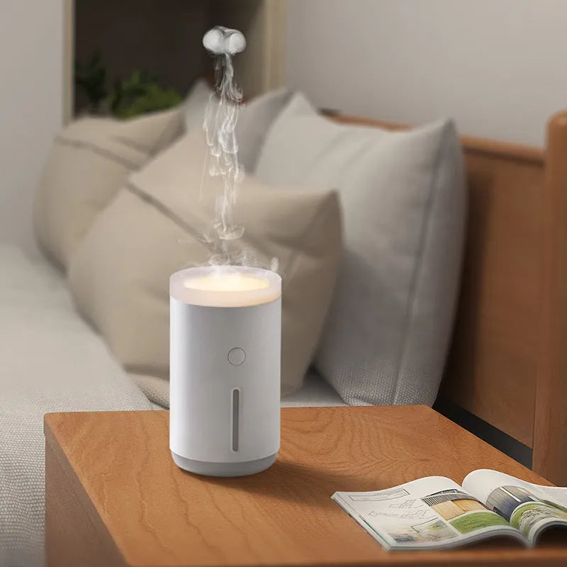 Spitting Circle humidifier in porcelain white with large fog output and dual atomisation modes for desktop use