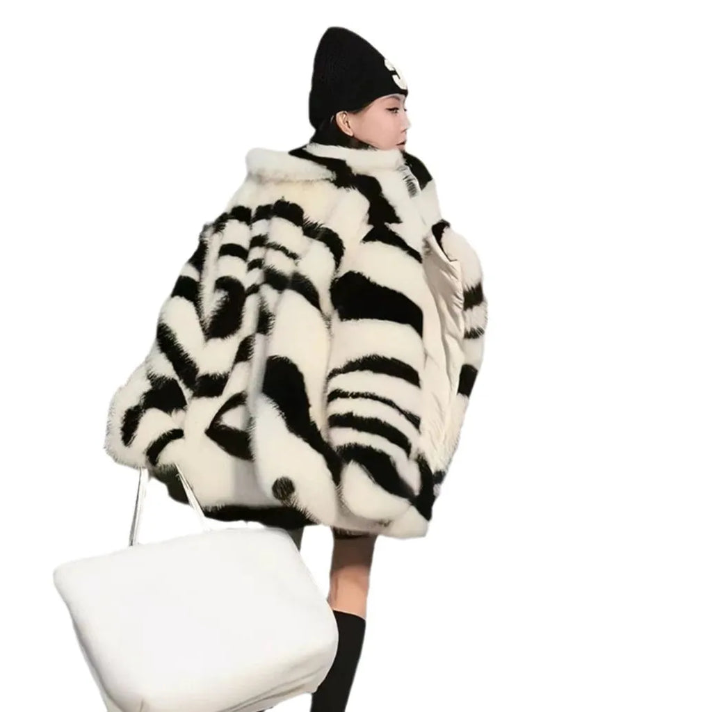 Women's long sleeve zebra stripe top with large skimmer collar and fur effect fabric