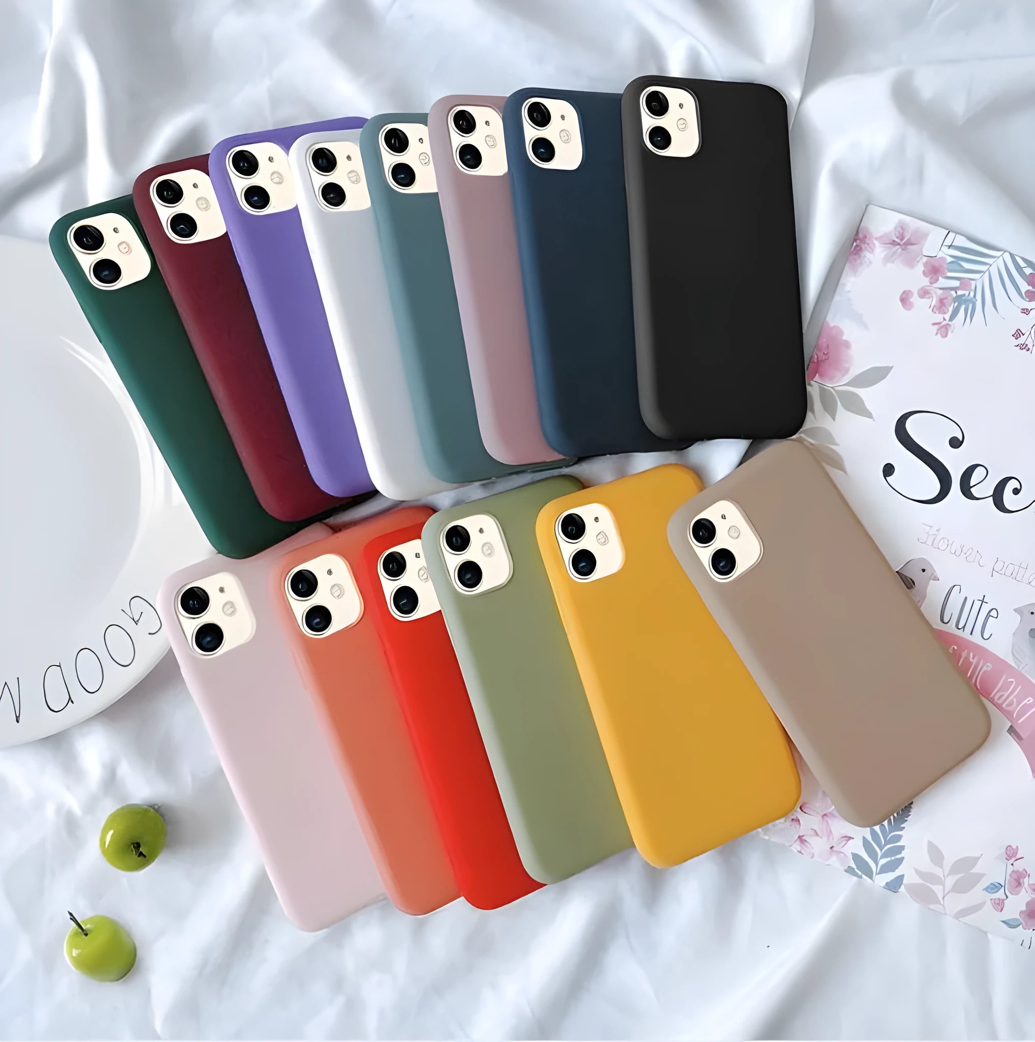 Frosted matte soft shell phone case for iPhone, shown in multiple colour options including blue, pink and black.