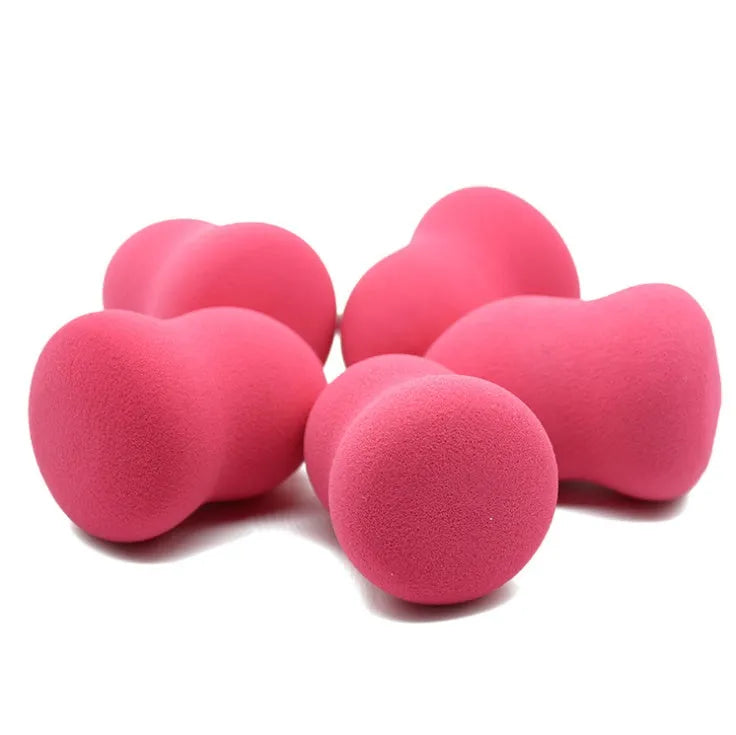 Pink makeup foundation sponge on white background showing 4cm width and 5.6cm height