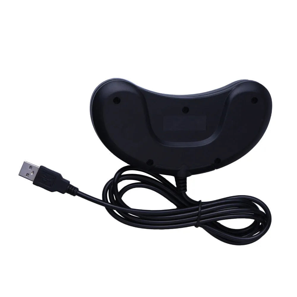 Black Sega USB PC game controller with 1.8m cable on a desk.
