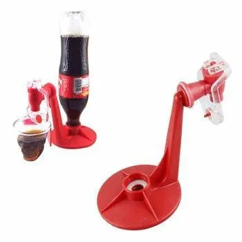 Red plastic Magic Tap soda dispenser attached to inverted 2-litre bottle for push-button drink serving