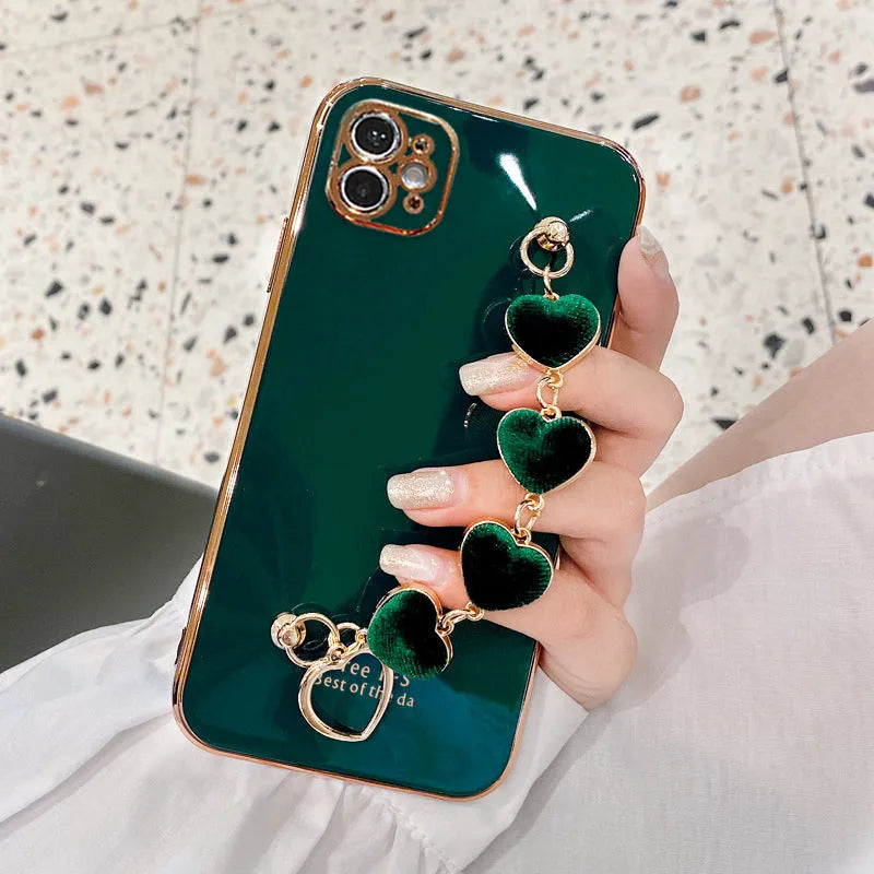 Green silicone mobile phone case with an attached white bracelet for a Samsung Galaxy model.