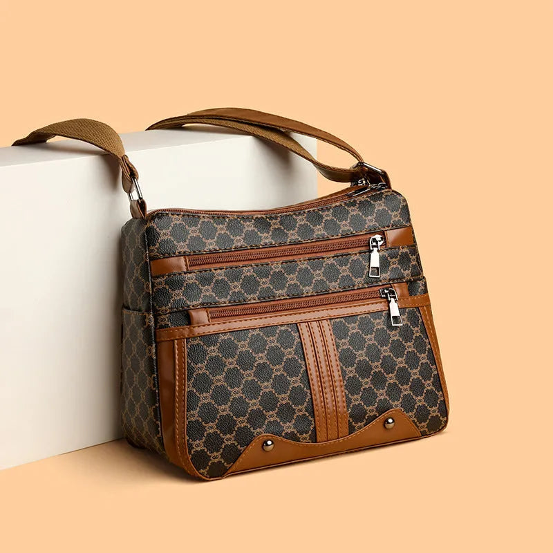 Brown and white large women's crossbody bag with stitching pattern detail
