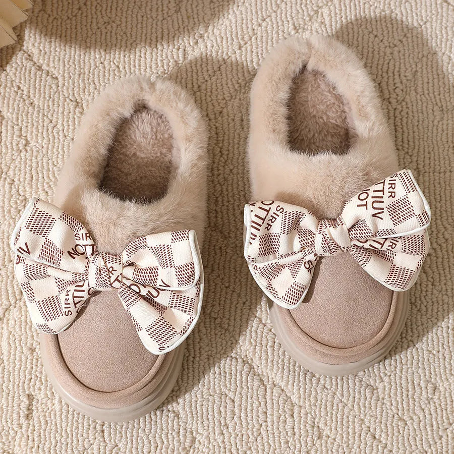 Bowknot plush slippers for women with suede upper, rubber sole, and short plush lining in bow brown, black, or khaki.