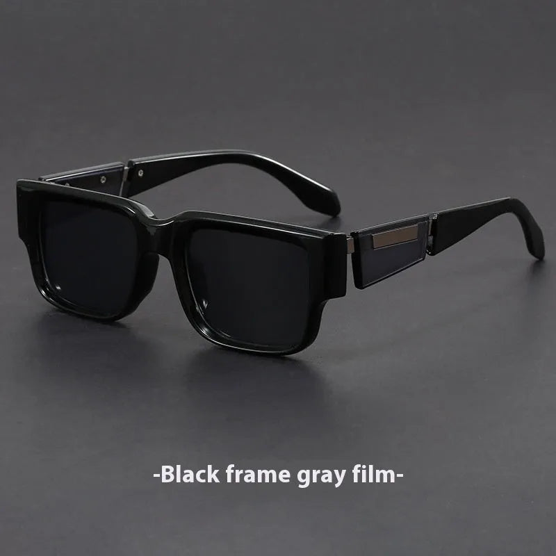 Gray blue square sunglasses with a thick retro frame and UV-protective lenses.