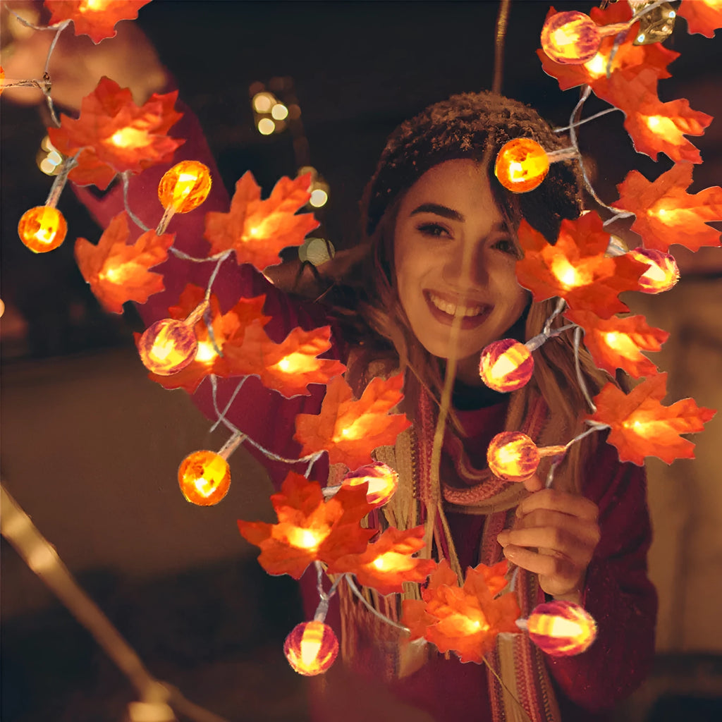 Halloween LED string lights with pumpkin and maple leaf designs, 1.5m 10-light warm white battery-operated decoration