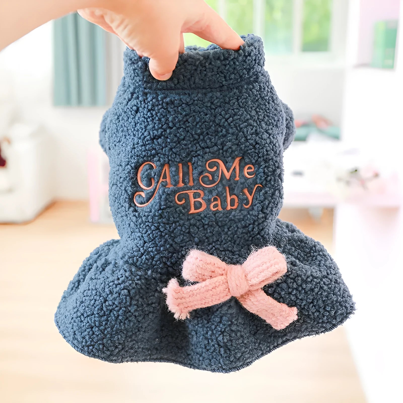 Dog wearing pink fleece skirt with baby letter pattern, Berber fleece pet clothing