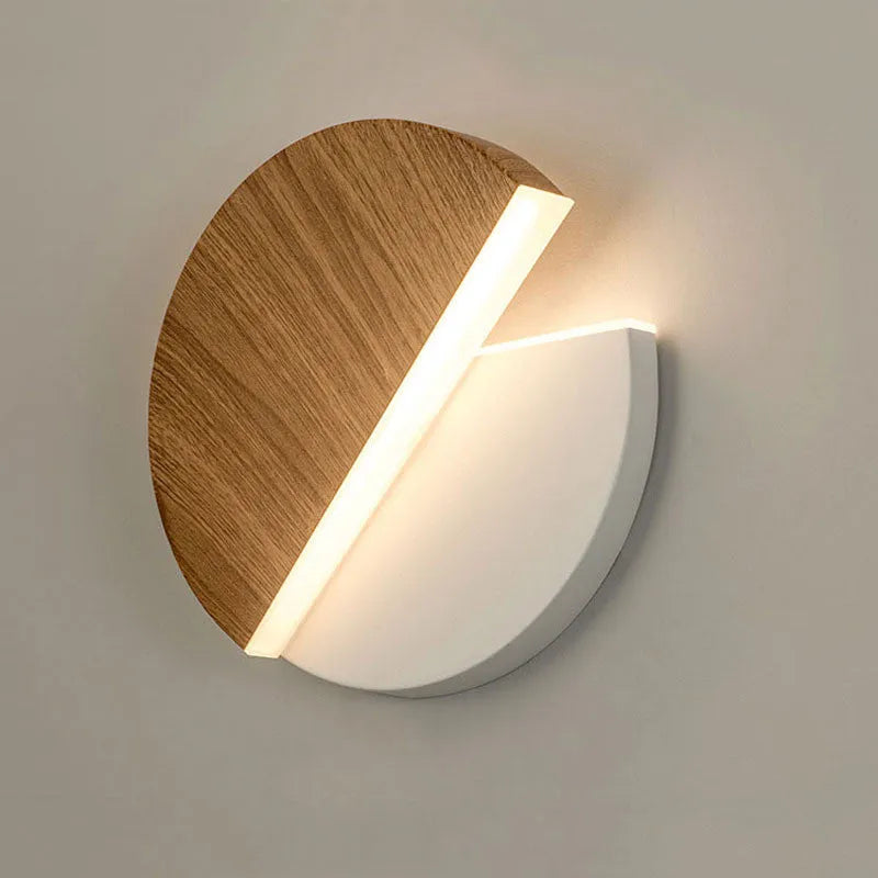 Rotating round LED wall light in black and white wrought iron and acrylic 10W warm white