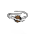 Adjustable Saturn open ring for women with white gold electroplated finish on silver