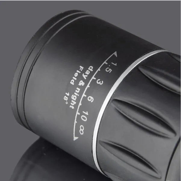 Black 16x52 high-power monocular telescope with wide-angle lens and eyepiece adjustment focus ring.