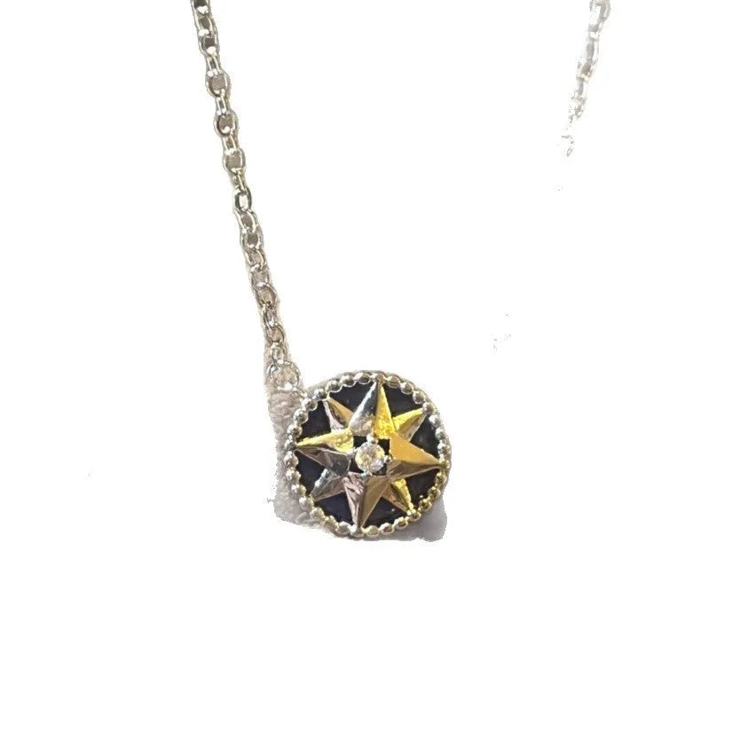 Women's compass necklace with round black agate inlay, geometric pendant, and curb chain in gold or platinum colour