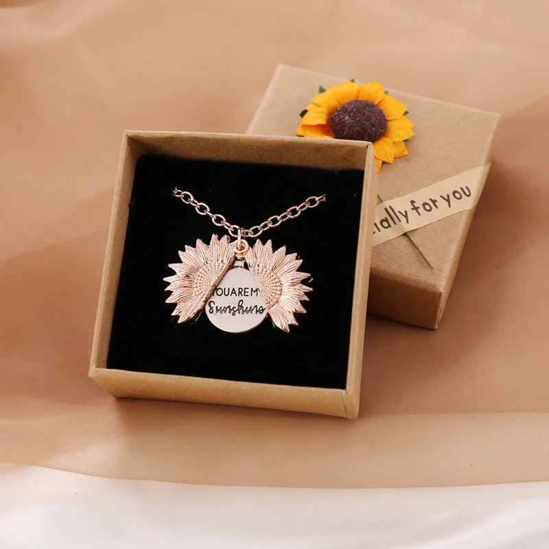 A stunning sunflower pendant necklace with an adjustable chain in various fashionable colors