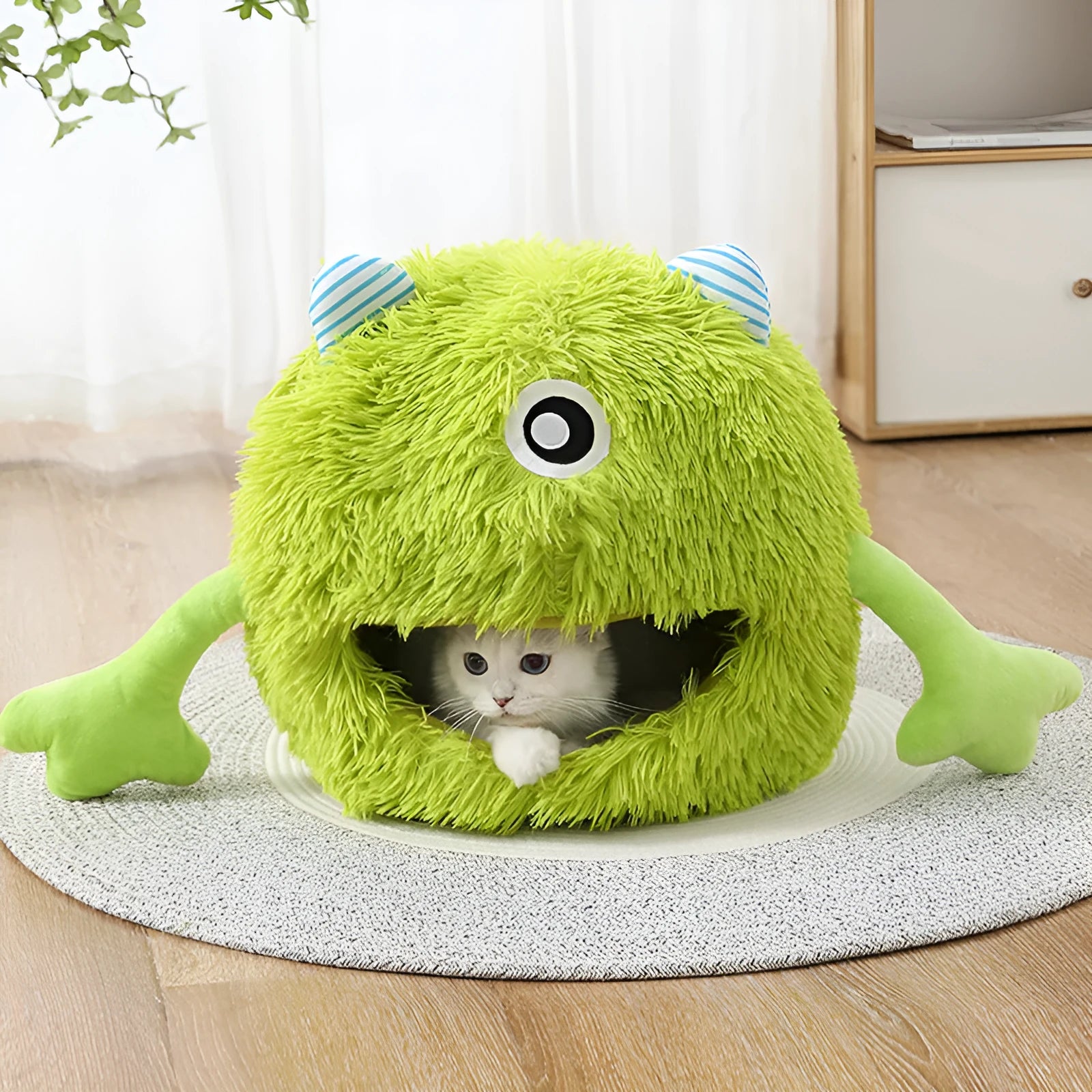 Round fluffy pet bed for cats and small dogs with non-slip base in three sizes
