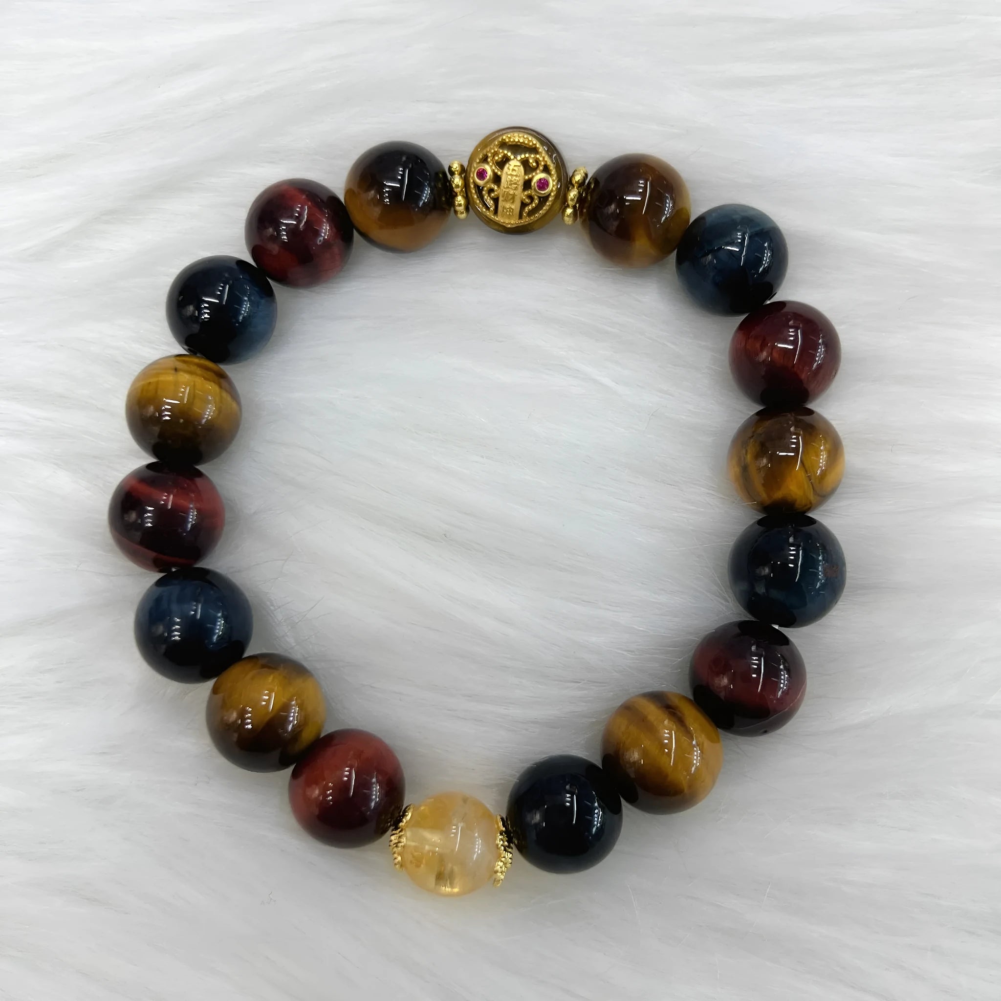 Natural golden-brown tiger eye gemstone bead bracelet with an adjustable clasp on a wrist.