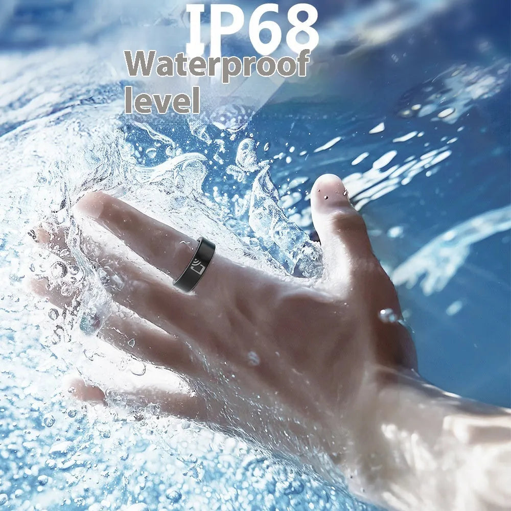 Black ceramic smart ring for health monitoring on a finger, showing a charging case accessory.