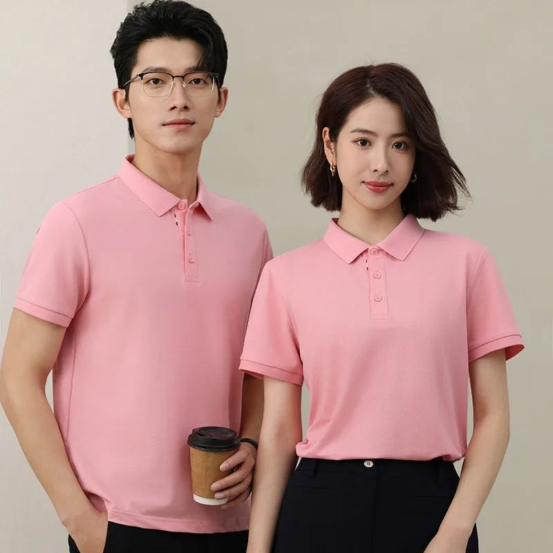 Solid colour short sleeve catering work polo shirt on a hanger, available in multiple colours.