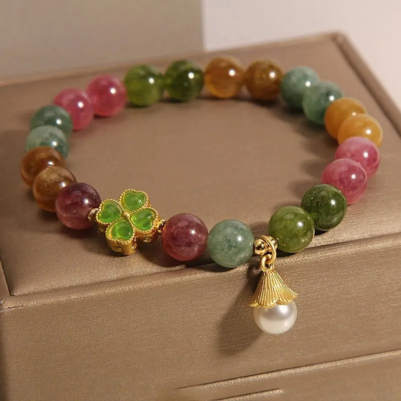 Women's colourful tourmaline bracelet with four-leaf clover charm and pearl pendant geometric design
