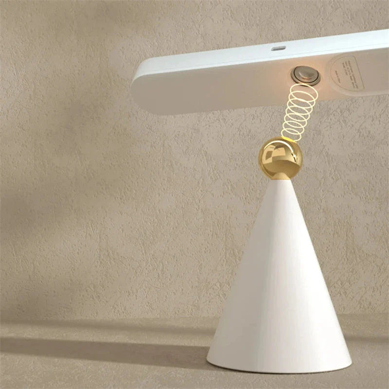 Versatile geometric desk lamp with wireless, magnetic, and multifunctional features for modern workspace lighting