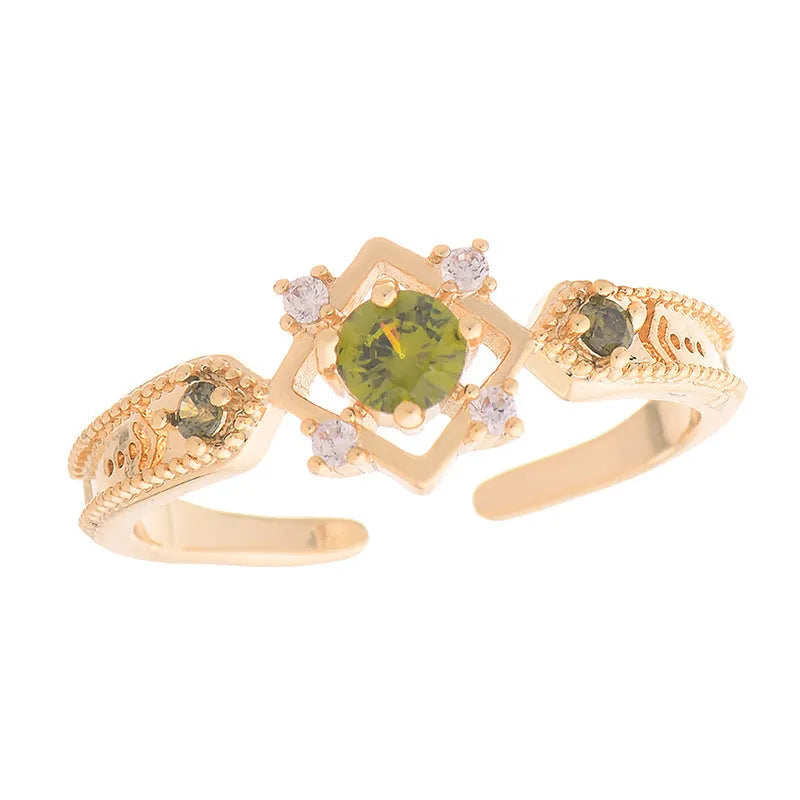 French style geometric open mouth copper ring with purple zircon stones on a model's hand.