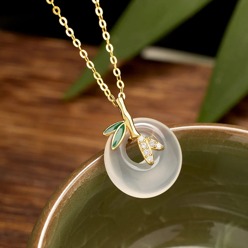 Natural chalcedony peace buckle pendant necklace in 925 silver with leaf shape and bamboo joint design, white gold finish
