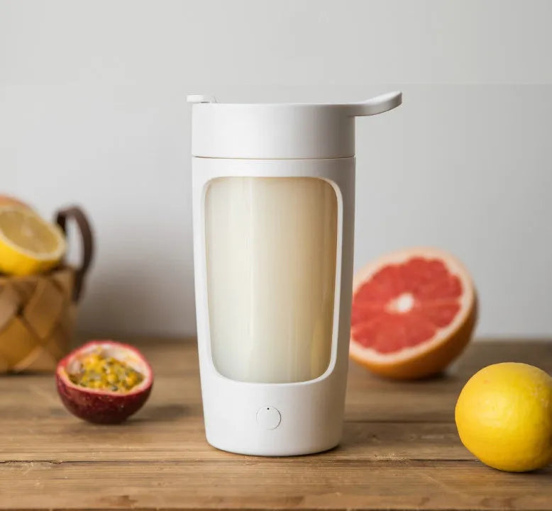 Portable rechargeable juice blender with 650ml capacity cup in black, blue, pink, or white colours