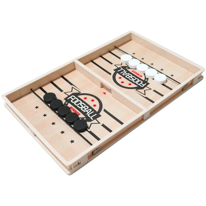 Wooden double battle catapult desktop board game with two-player pieces, shown as a tabletop parent-child puzzle toy.