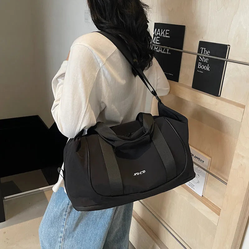 Oxford cloth yoga crossbody bag in beige, black, or brown with one shoulder strap