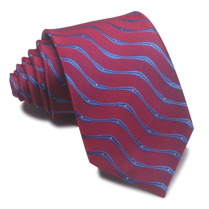 Close-up of a striped jacquard tie showing its textured pattern and arrow shape.