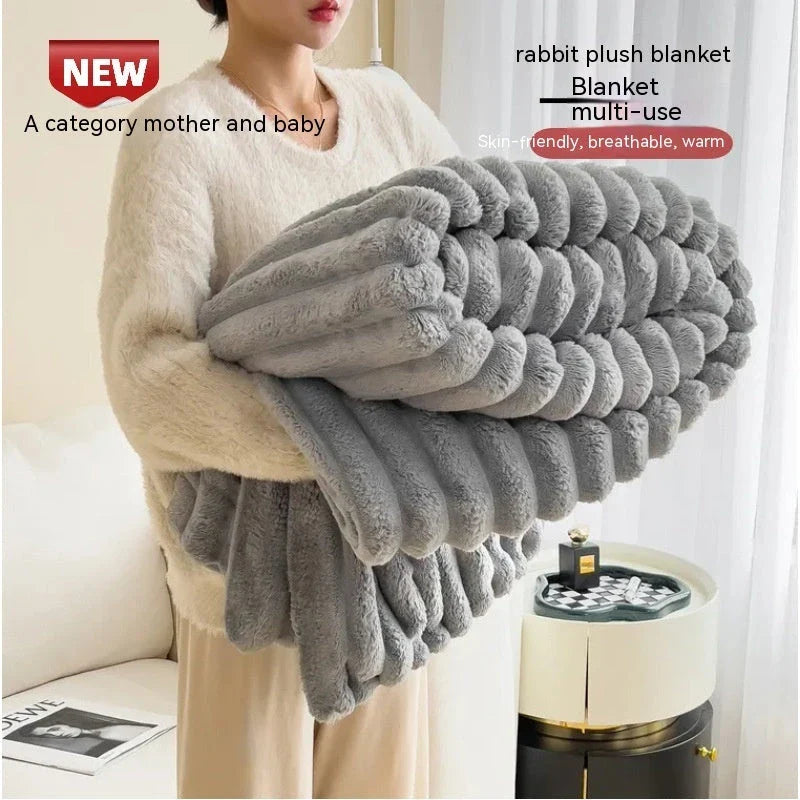 Luxurious faux rabbit fur blanket in various soft and cozy colors, featuring a thick and plush design for maximum warmth and comfort.