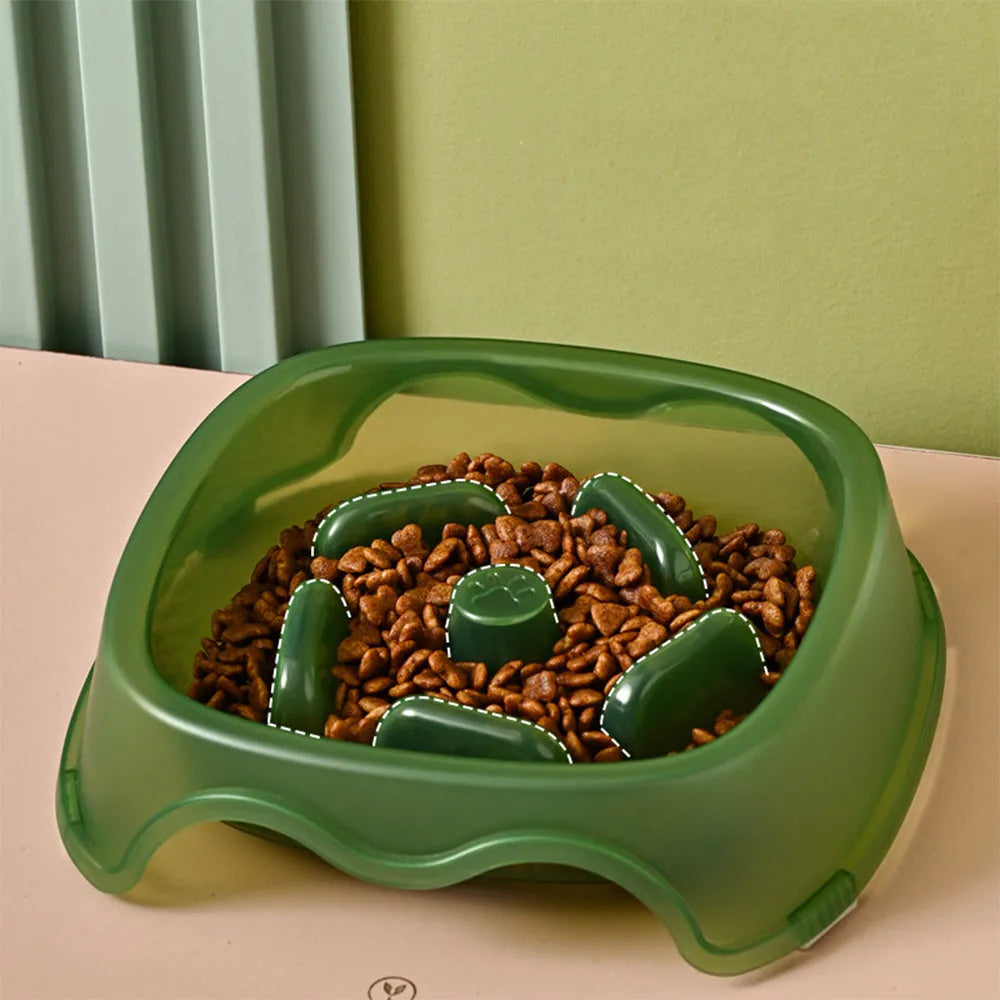 Blue plastic dog slow feeder bowl with internal maze pattern for portion control.