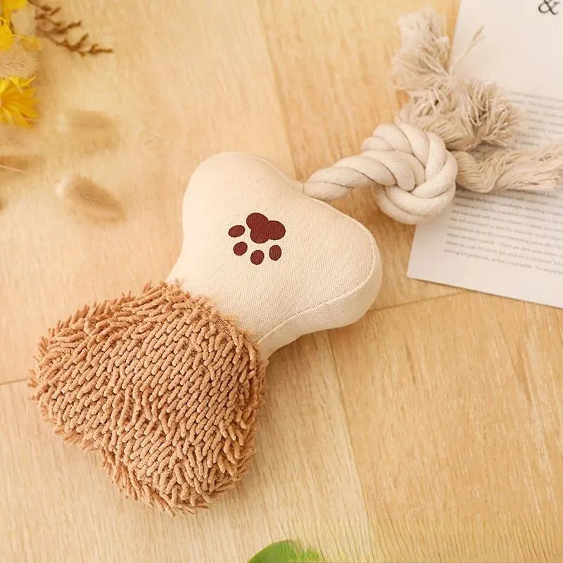 Pet cotton rope toy in bone shape with sound element and canvas covering for dog dental care