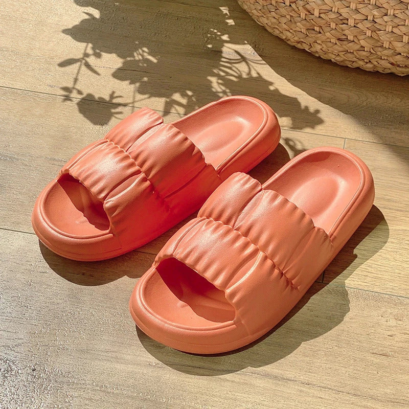 Stylish women's bathroom slides with soft, comfortable EVA soles and unique floral accents in a variety of vibrant colors