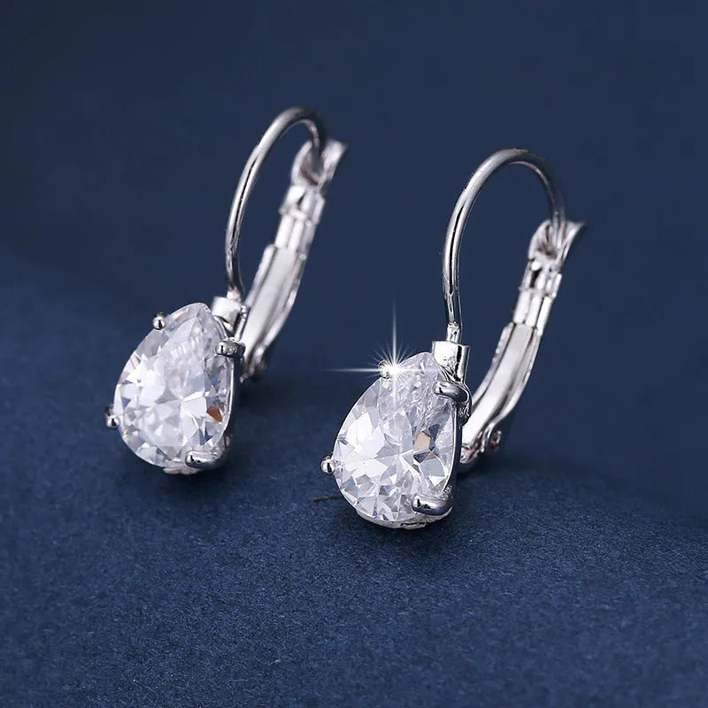 Women's drop-shaped fashion earrings in gold or platinum finish with copper construction