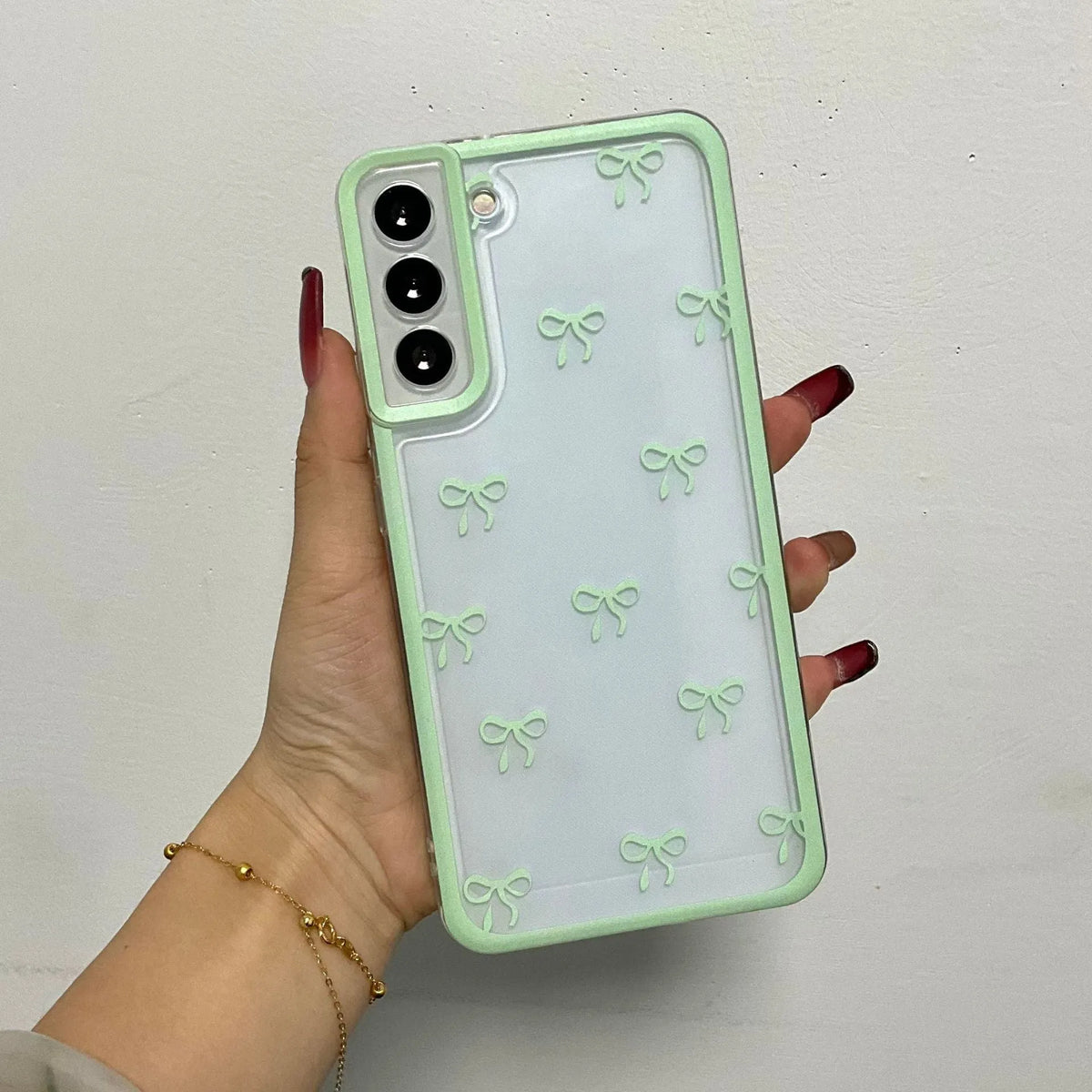 Transparent Samsung TPU phone case with three-dimensional bowknot design in blue, pink or purple bow options.