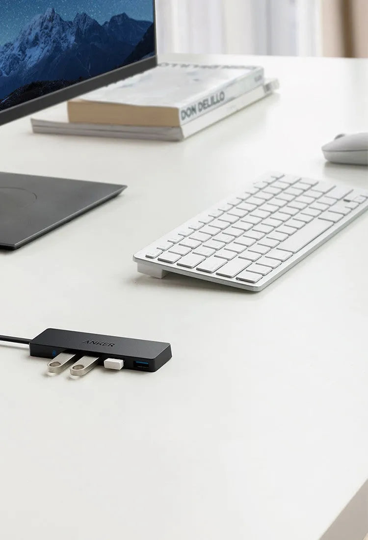 Black Anker USB 3.0 4-port hub with 200mm cable for laptop and desktop computers