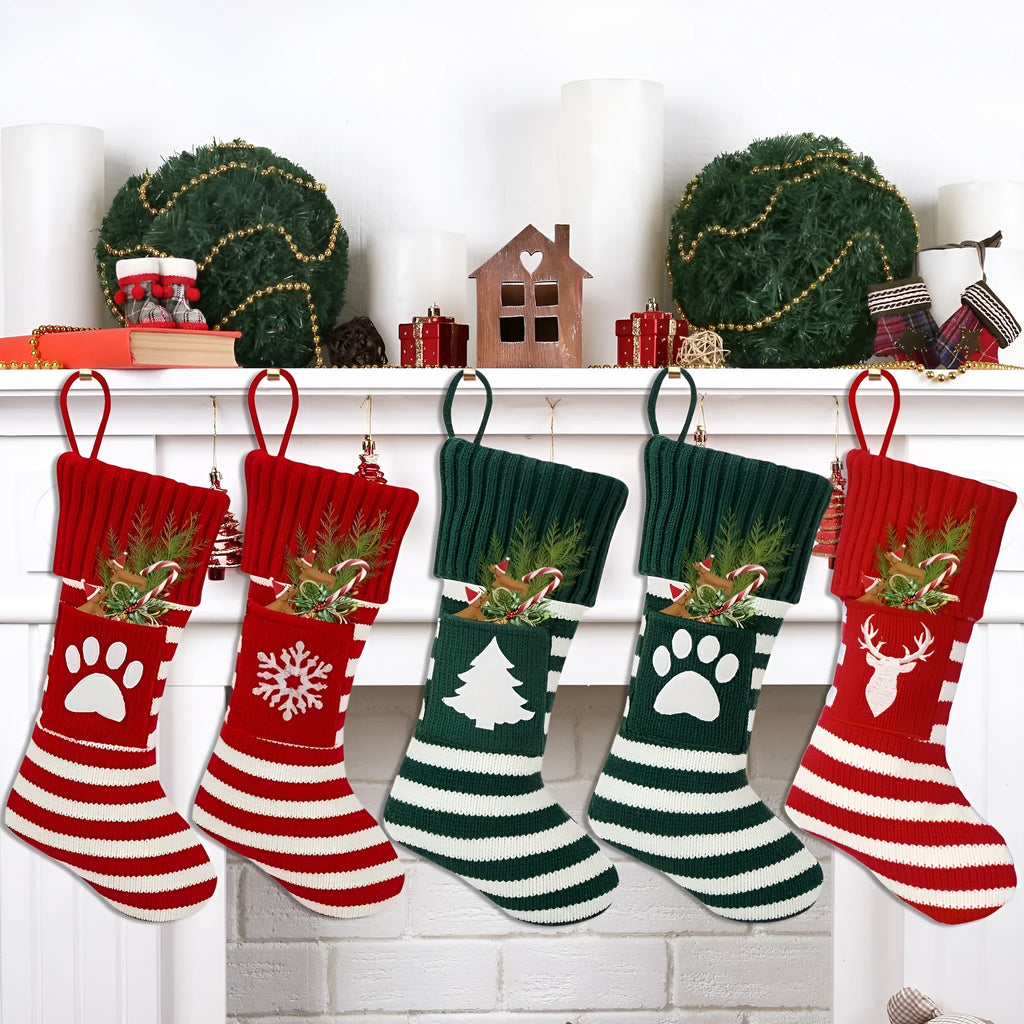 Christmas knitted cat and dog socks gift bag with red snowflake design on a festive background